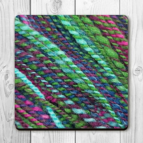 Coaster printed with images of handspun yarn and cork backing