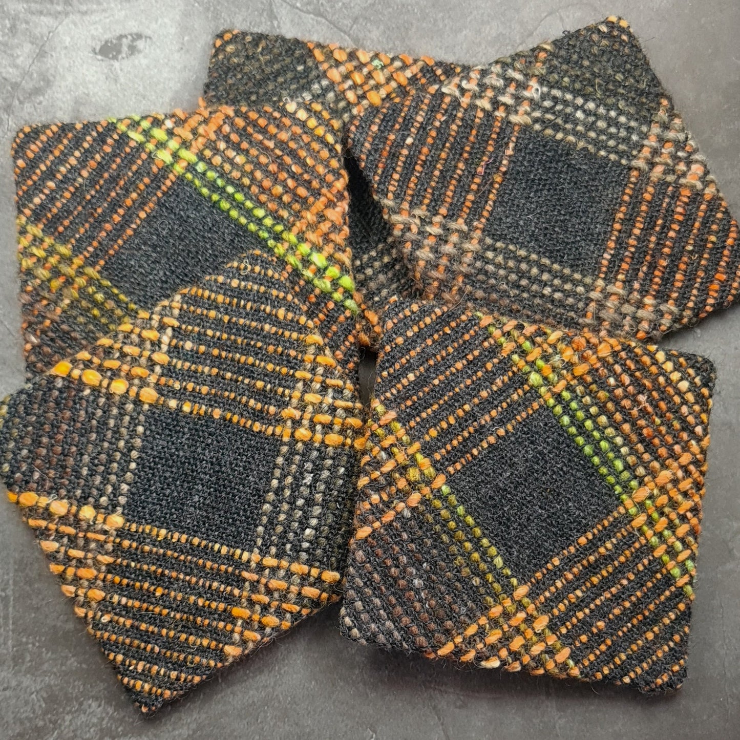 Coaster featuring handwoven fabric and Cork backing - Charcoal & Orange