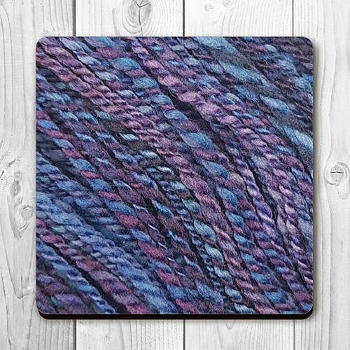 Coaster printed with images of handspun yarn and cork backing
