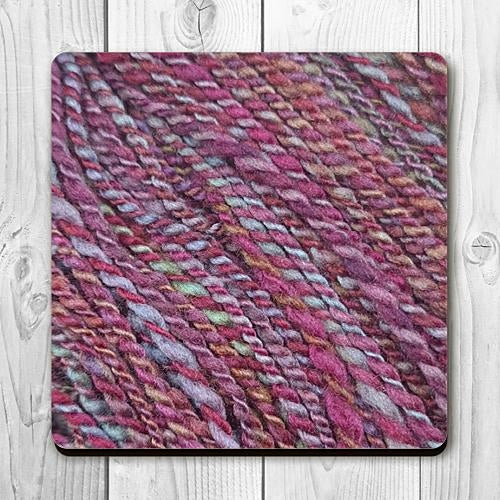 Coaster printed with images of handspun yarn and cork backing